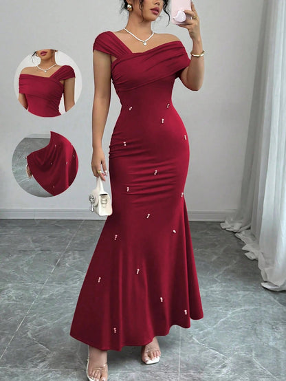 Fashzeo burgundy asymmetrical beaded mermaid long dress featuring a sleek one-shoulder neckline and floor-length evening gown silhouette