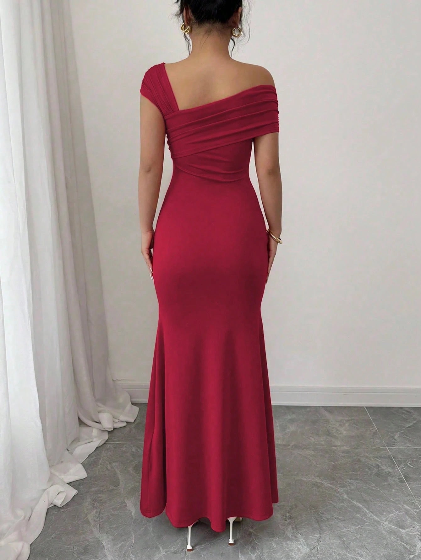 Fashzeo burgundy asymmetrical beaded mermaid long dress featuring a sleek one-shoulder neckline and floor-length evening gown silhouette