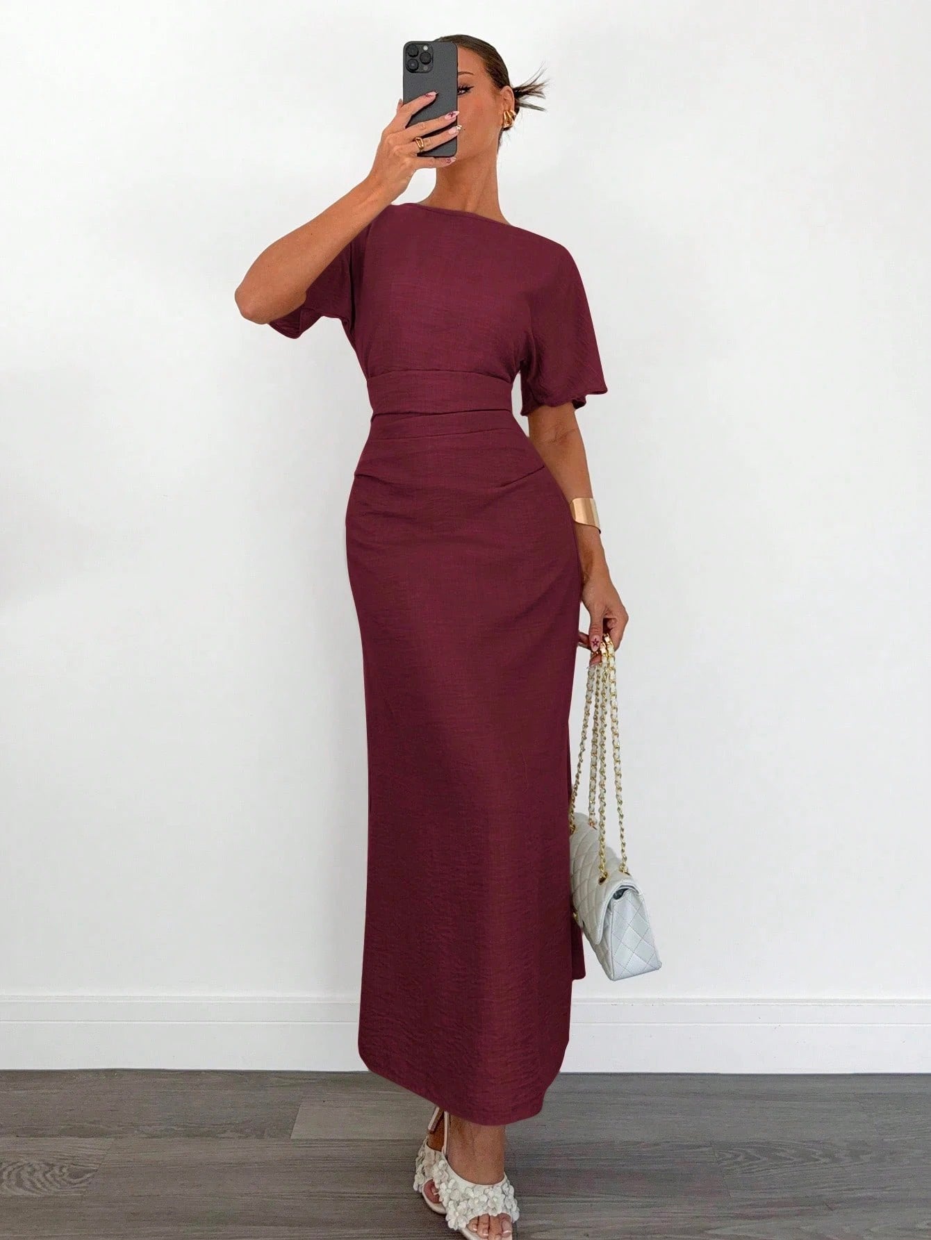 Fashzeo burgundy linen blend long dress featuring a square neck, high slit, and ruffled fishtail hem for a quiet luxury aesthetic.