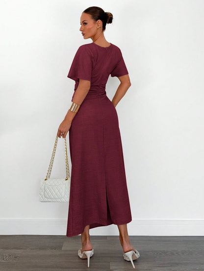 Fashzeo burgundy linen blend long dress featuring a square neck, high slit, and ruffled fishtail hem for a quiet luxury aesthetic.1