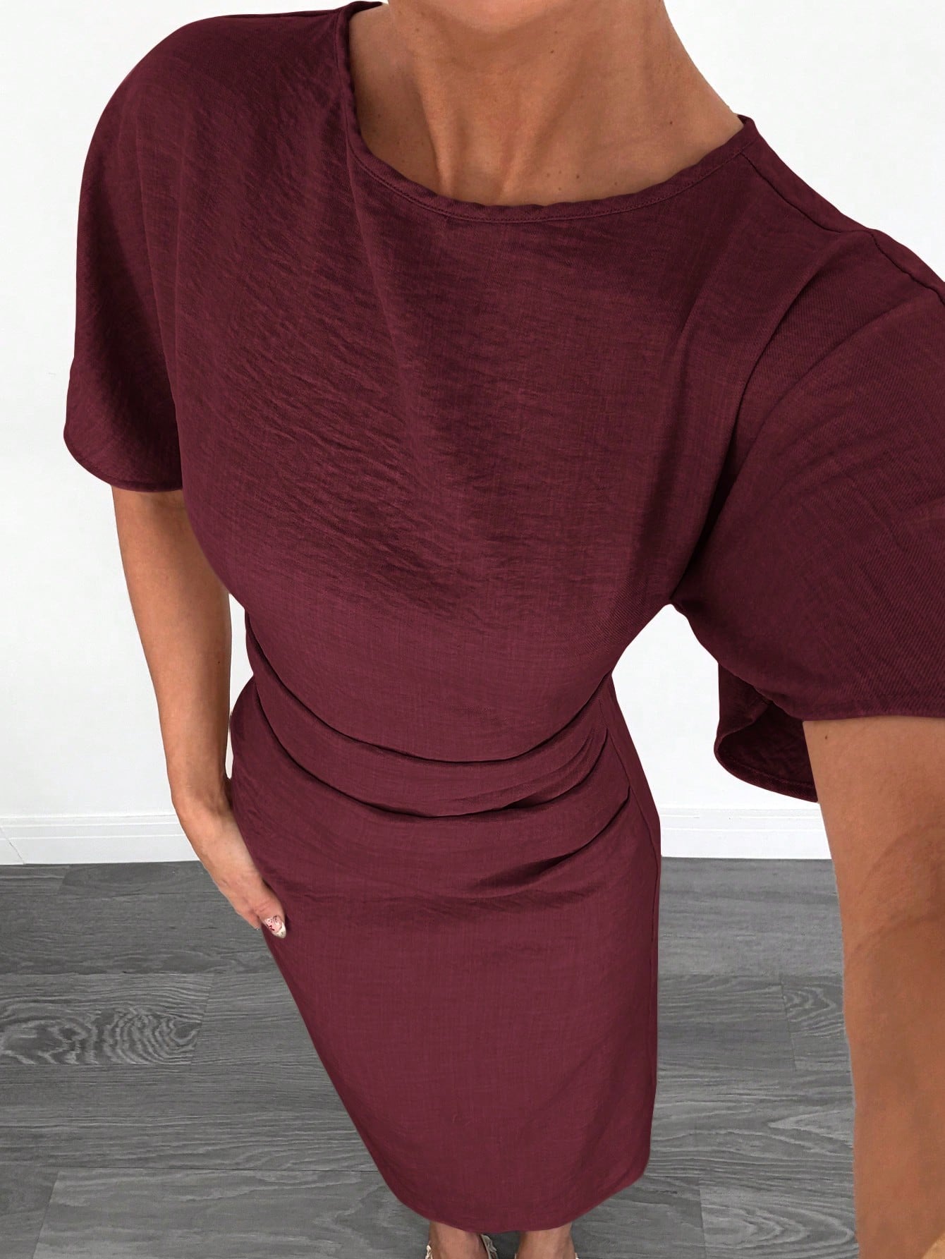 Fashzeo burgundy linen blend long dress featuring a square neck, high slit, and ruffled fishtail hem for a quiet luxury aesthetic.3