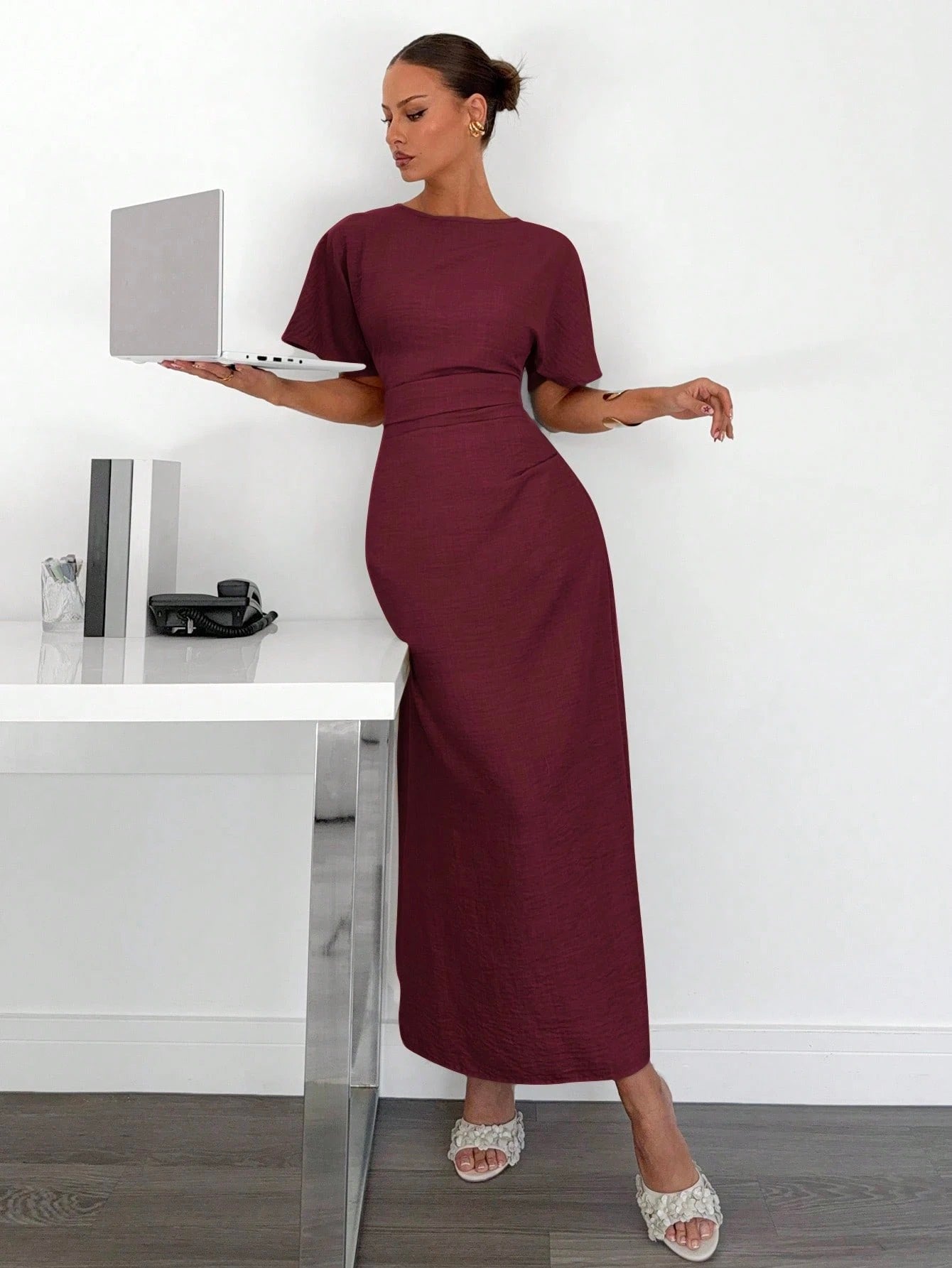 Fashzeo burgundy linen blend long dress featuring a square neck, high slit, and ruffled fishtail hem for a quiet luxury aesthetic.4