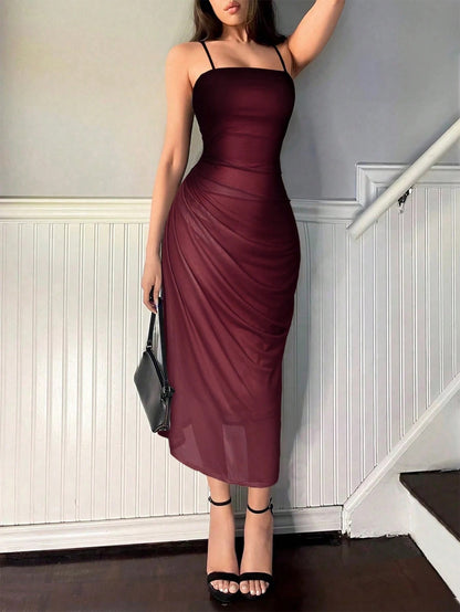 Fashzeo burgundy ombre pleated long dress with a sunset gradient effect and delicate spaghetti straps for premium Indian fashion.