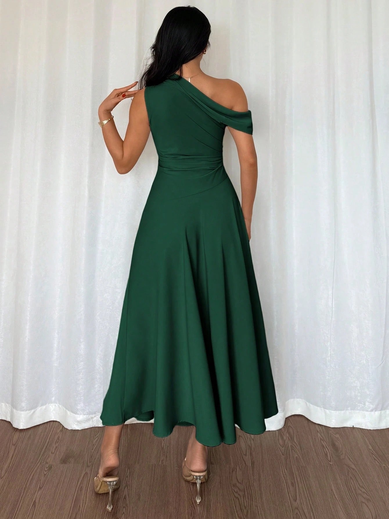 Fashzeo dark green one-shoulder fit and flare dress with dramatic ruffle detail for summer vacations and graduation ceremonies1