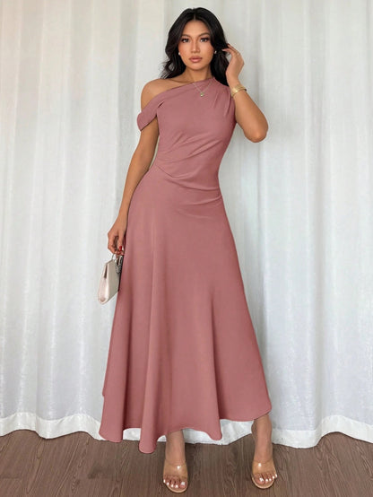 Fashzeo dusty pink one-shoulder fit and flare dress with dramatic ruffle detail for summer vacations and graduation ceremonies.