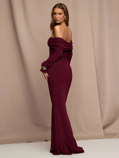 Fashzeo maroon off-shoulder long sleeve gown with ruched neckline.