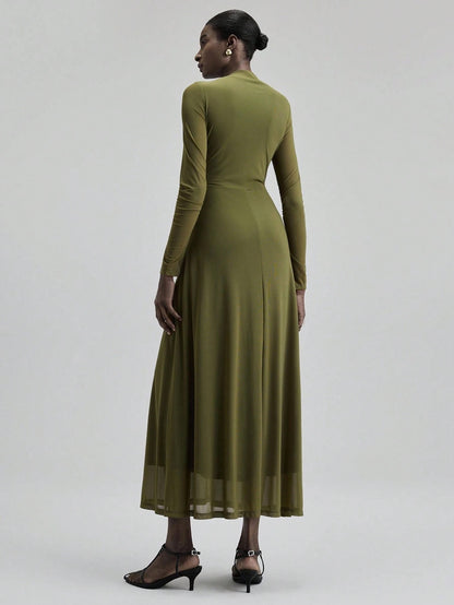 Fashzeo minimalist stand collar long dress in solid army green, designed for a sophisticated office-to-evening aesthetic.