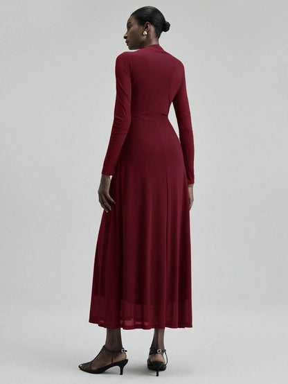 Fashzeo minimalist stand collar long dress in solid burgundy, designed for a sophisticated office-to-evening aesthetic.1