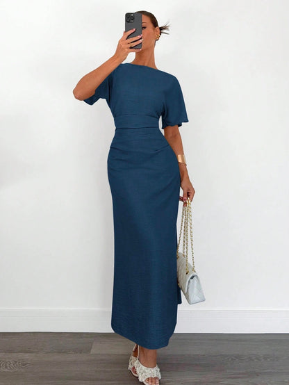 Fashzeo navy blue linen blend long dress featuring a square neck, high slit, and ruffled fishtail hem for a quiet luxury aesthetic.