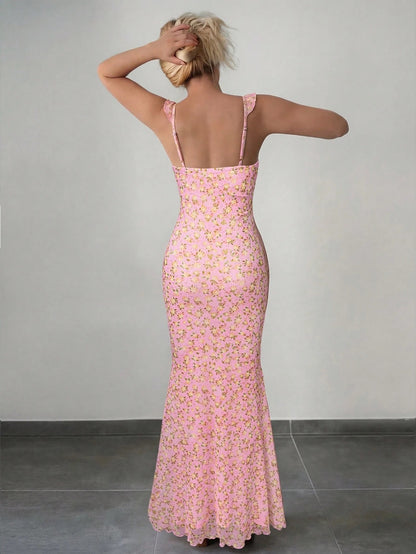 Fashzeo pink floral print ruffle-trim maxi dress with a ruched waist, styled for an elegant and trendy summer look.