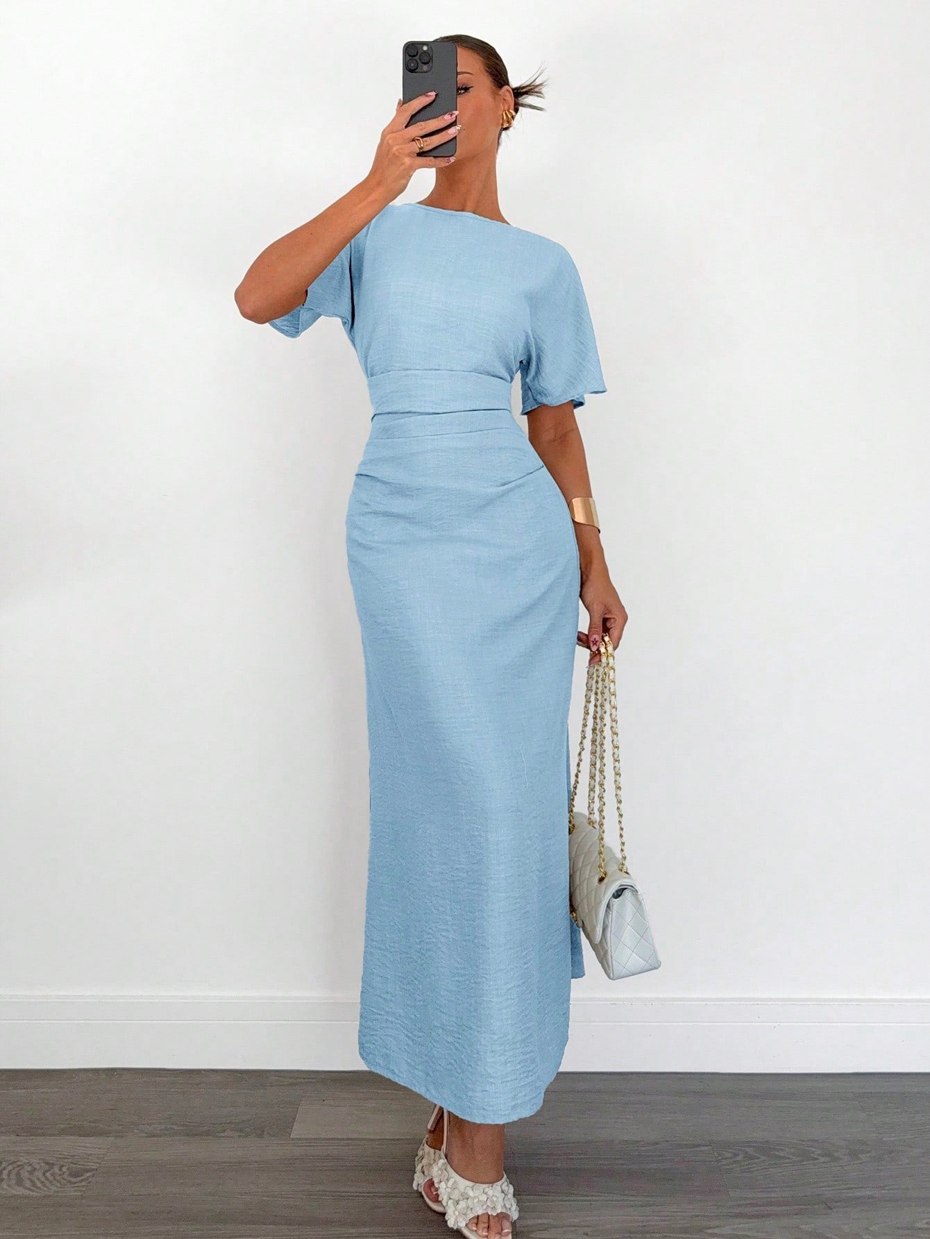 Fashzeo sky blue linen blend long dress featuring a square neck, high slit, and ruffled fishtail hem for a quiet luxury aesthetic.
