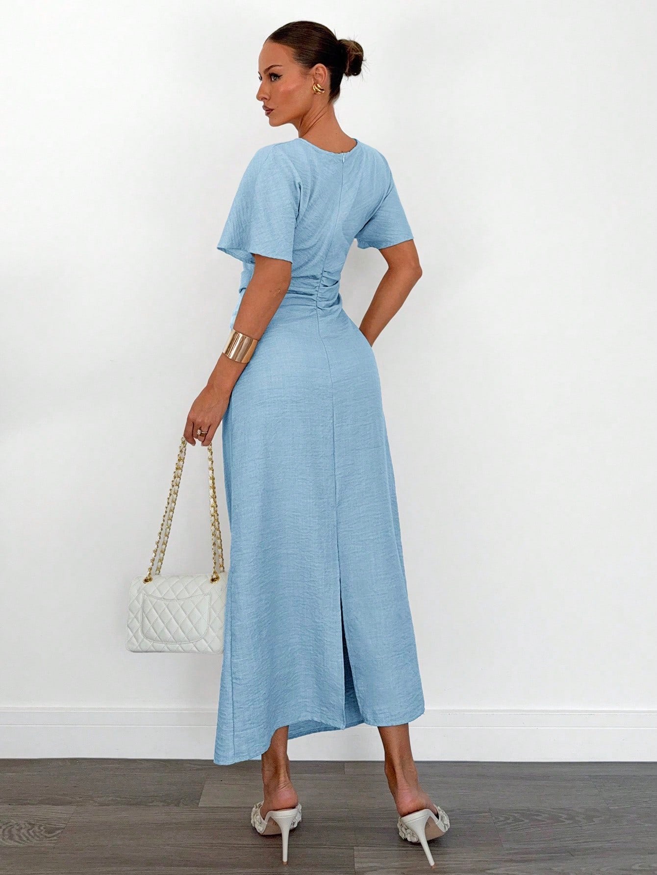 Fashzeo sky blue linen blend long dress featuring a square neck, high slit, and ruffled fishtail hem for a quiet luxury aesthetic.1