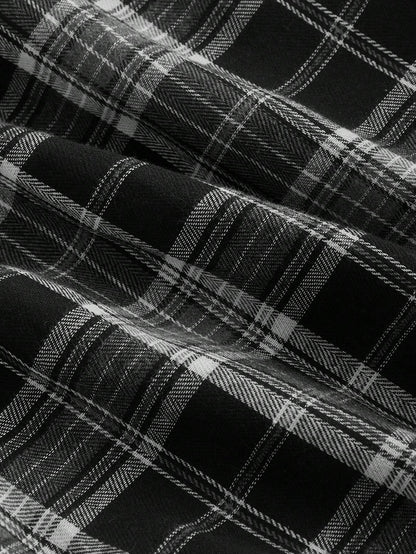 Fashzeo vintage plaid midi slip dress in black-white featuring a cinched waist and flared hem3