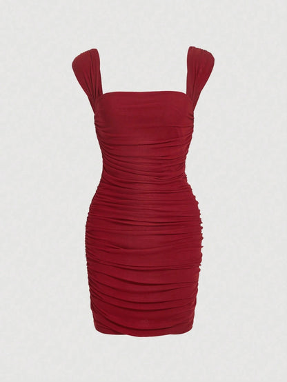 Fashzeo women's Burgundy sleeveless ruched cami bodycon mini dress with square neckline and sheer mesh overlay in a sexy party style.