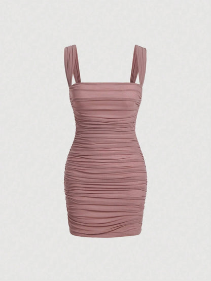 Fashzeo women's Dusty Pink sleeveless ruched cami bodycon mini dress with square neckline and sheer mesh overlay in a sexy party style.