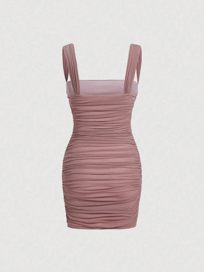 Fashzeo women's Dusty Pink sleeveless ruched cami bodycon mini dress with square neckline and sheer mesh overlay in a sexy party style.1