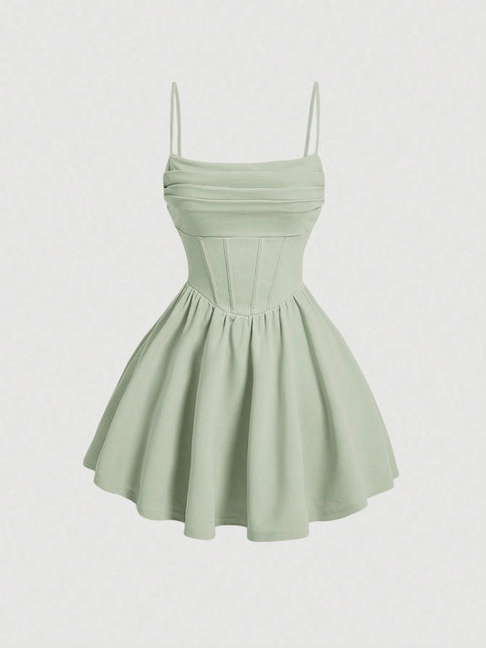 Fashzeo women's Mint green ruched bust cami mini dress with adjustable spaghetti straps and flared skirt for a summer vacation look