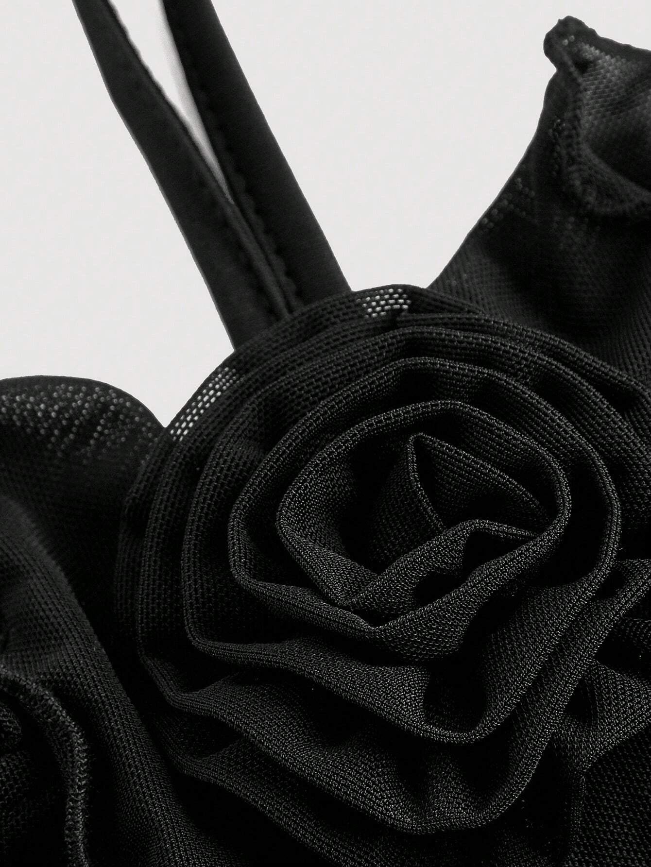 Fashzeo women's black sleeveless halter mini dress with 3D floral rosette decor and cascading ruffle trim in a sheer mesh fabric3