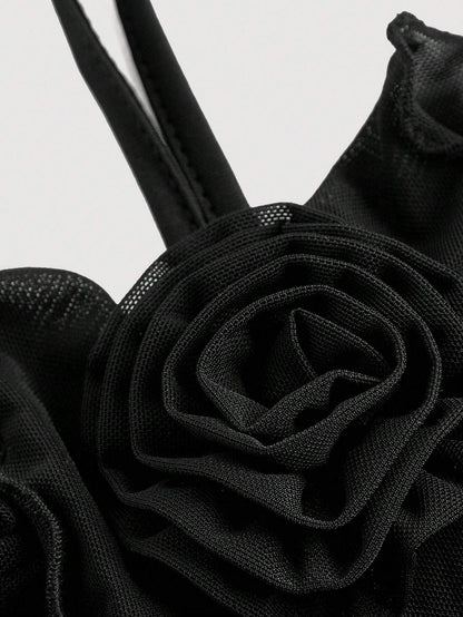 Fashzeo women's black sleeveless halter mini dress with 3D floral rosette decor and cascading ruffle trim in a sheer mesh fabric3