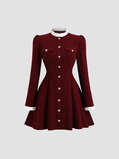 Fashzeo women's burgundy long sleeve mini dress featuring a ruffled stand collar, gold button-front, and flap pockets in a preppy vintage style.