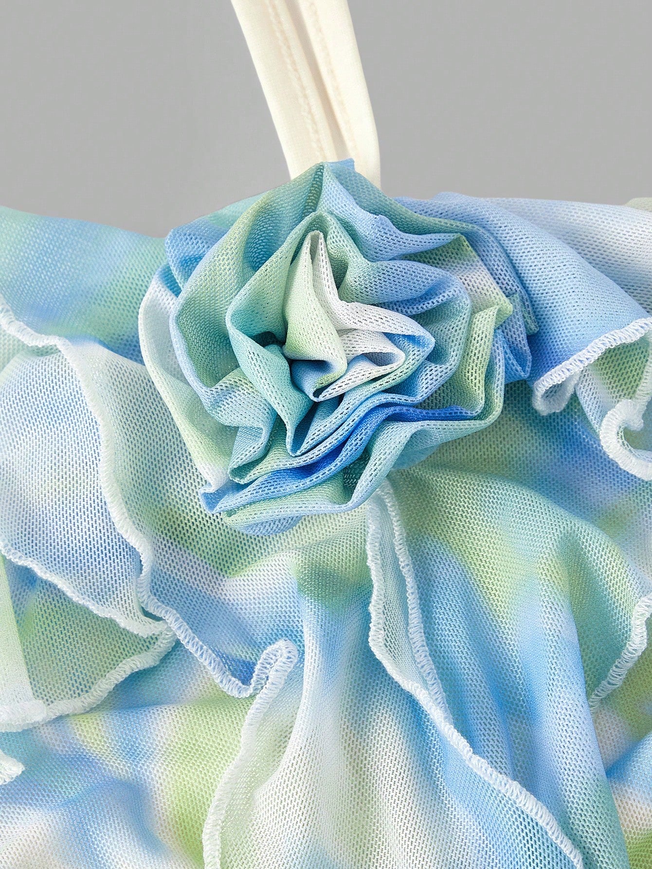 Fashzeo women's green floral mini dress featuring 3D rose appliqués, ribbon strap trim, and a tiered ruffle hem3