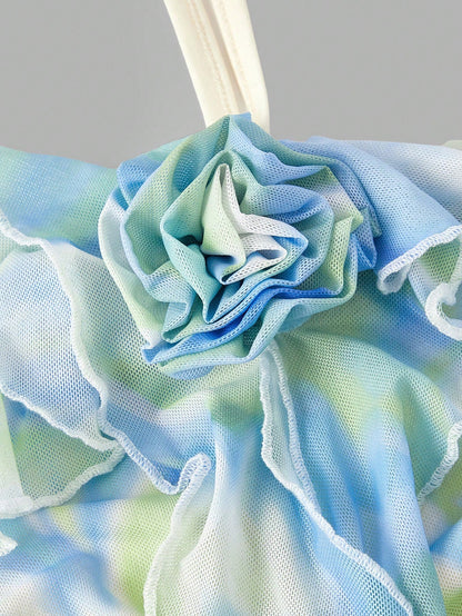 Fashzeo women's green floral mini dress featuring 3D rose appliqués, ribbon strap trim, and a tiered ruffle hem3
