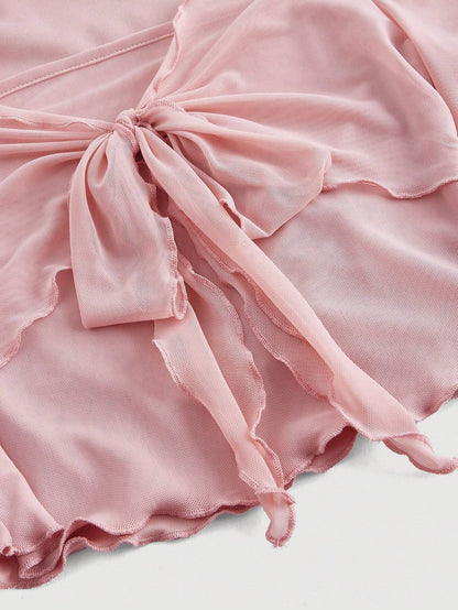 Fashzeo women's pink front-knot top with long sheer bell sleeves and lettuce-edge ruffle trim.
