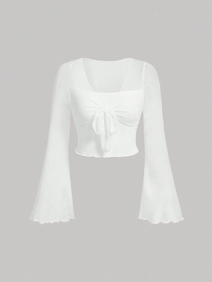 Fashzeo women's white front-knot top with long sheer bell sleeves and lettuce-edge ruffle trim.