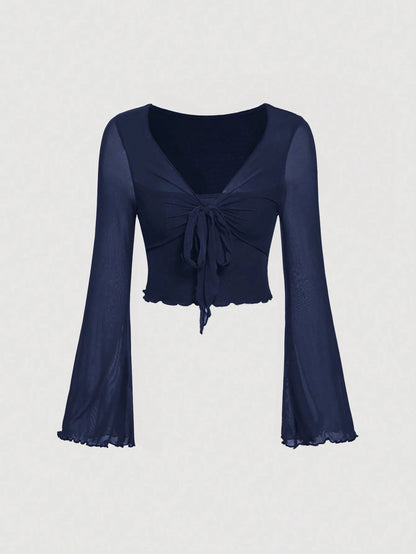 Fashzeo women's navy blue front-knot top with long sheer bell sleeves and lettuce-edge ruffle trim.