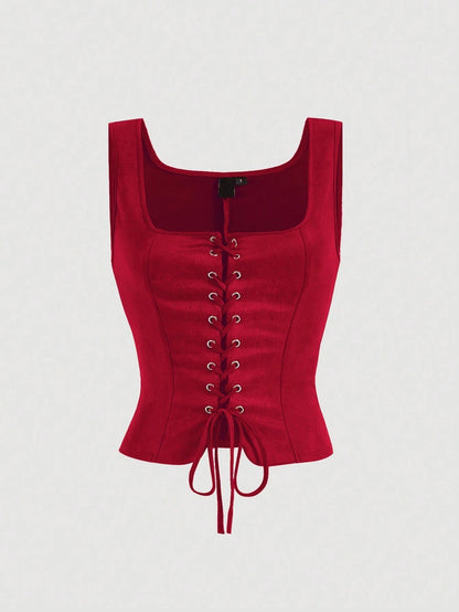 Red corset top on a light gray background