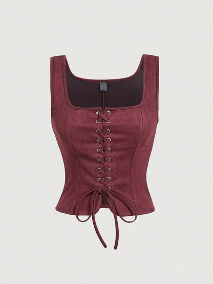 Maroon corset top with lace-up front on a light gray background