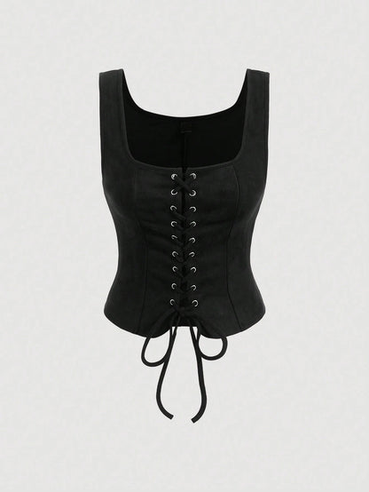 Black corset top on a light gray background