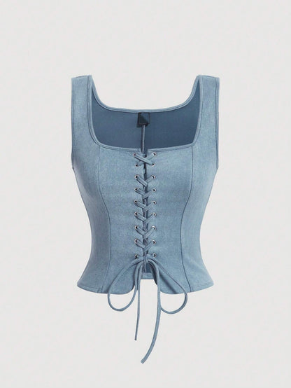 Light blue denim corset on a light gray background