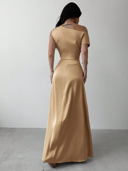 Model wearing the Fashzeo apricot satin one-shoulder maxi gown with ruched detailing
