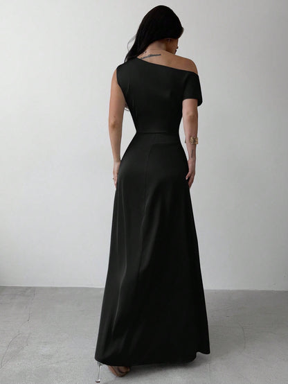 Model wearing the Fashzeo black satin one-shoulder maxi gown with ruched detailing