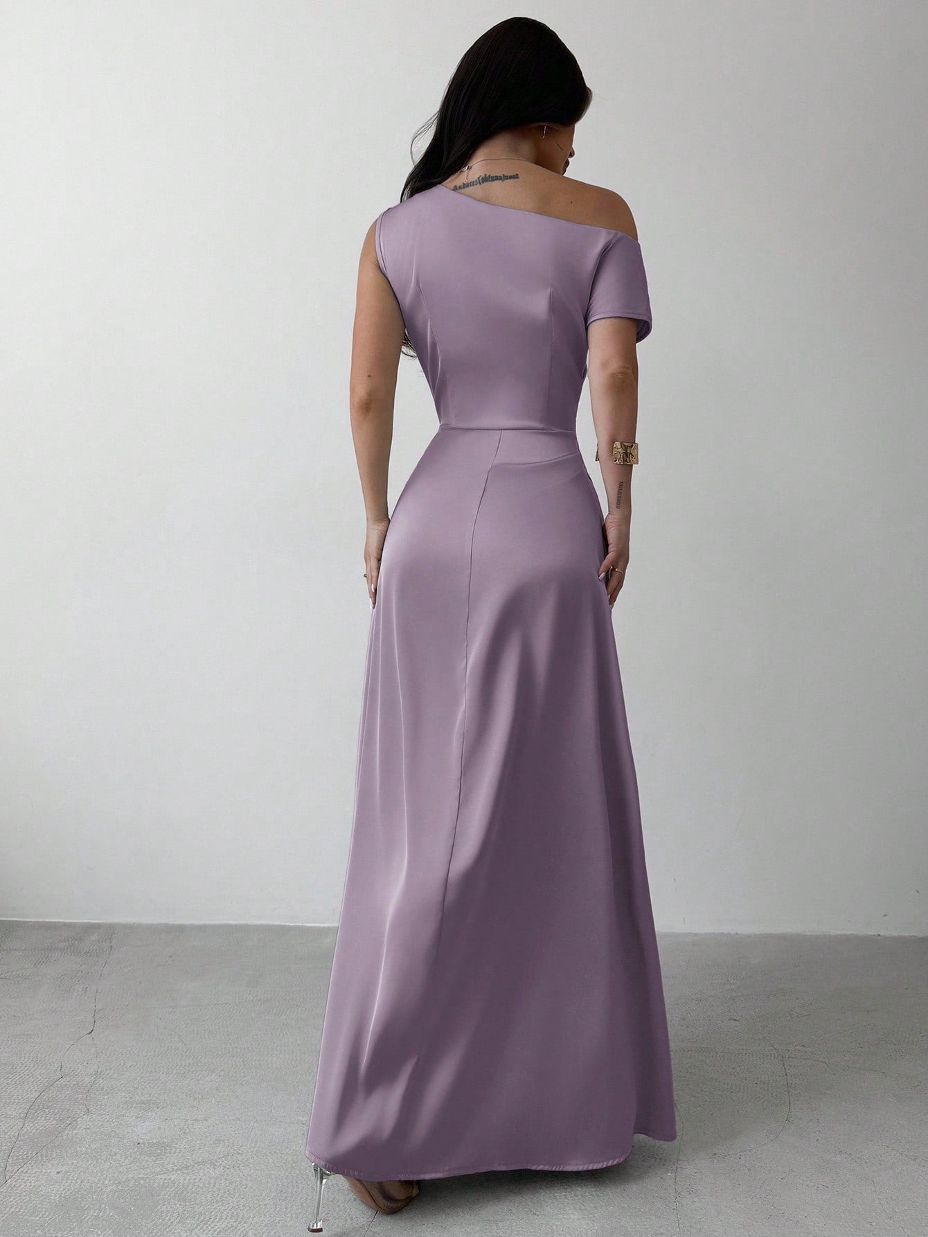 Model wearing the Fashzeo dusty purple satin one-shoulder maxi gown with ruched detailing