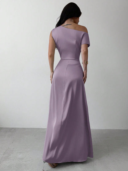 Model wearing the Fashzeo dusty purple satin one-shoulder maxi gown with ruched detailing