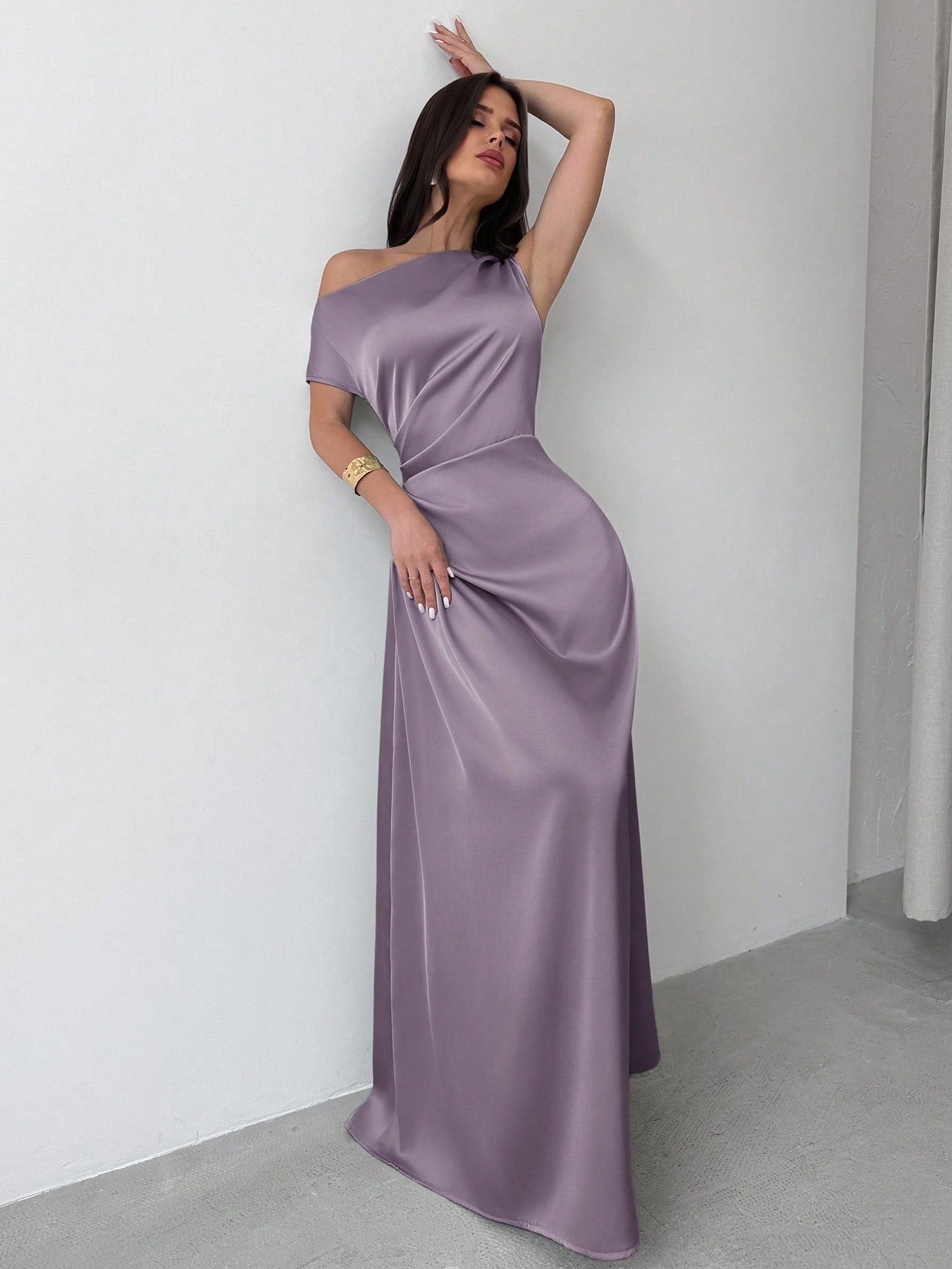 Model wearing the Fashzeo dusty purple satin one-shoulder maxi gown with ruched detailing