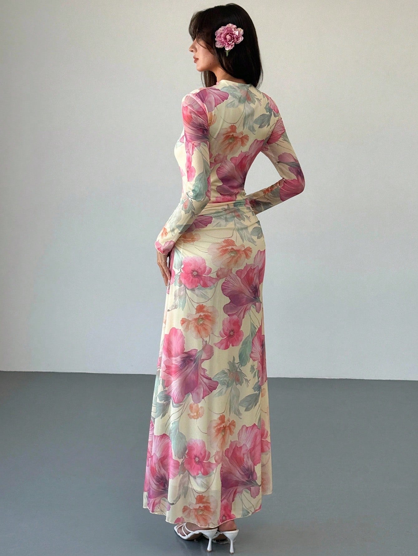Model wearing the Fashzeo floral mesh long-sleeve maxi dress in apricot multicolor.