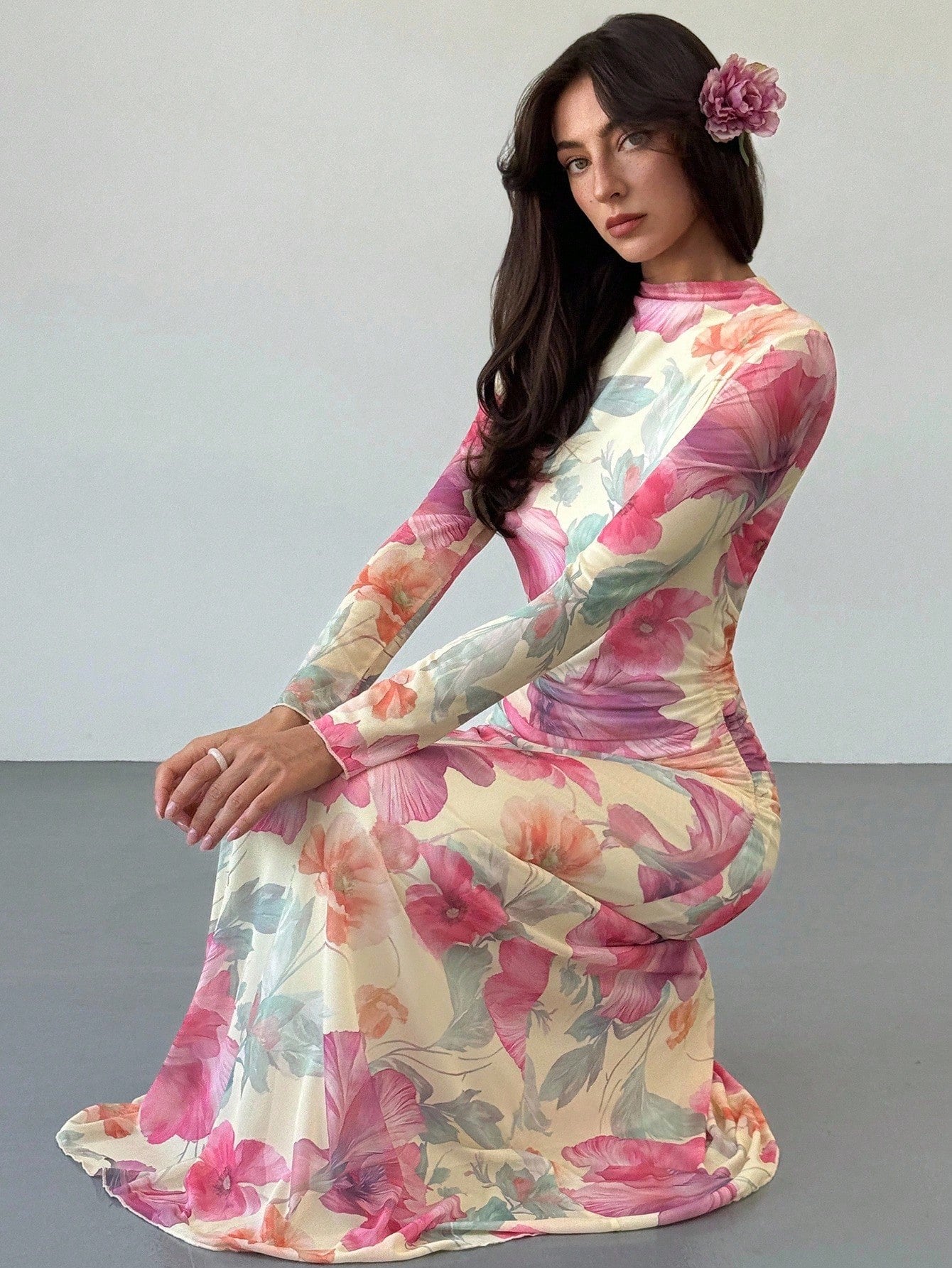 Model wearing the Fashzeo floral mesh long-sleeve maxi dress in apricot multicolor.