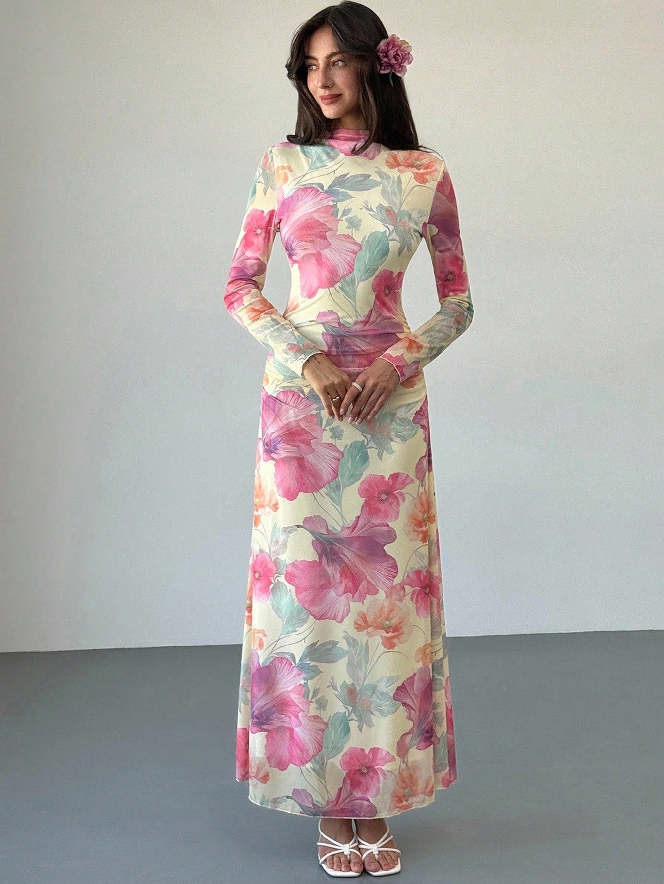 Model wearing the Fashzeo floral mesh long-sleeve maxi dress in apricot multicolor.