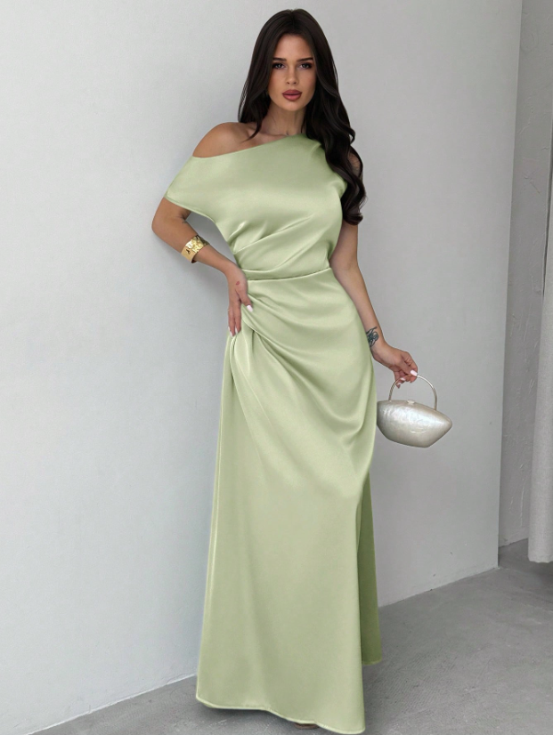Model wearing the Fashzeo green satin one-shoulder maxi gown with ruched detailing