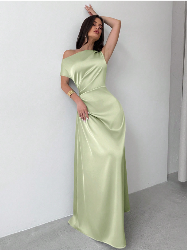 Model wearing the Fashzeo green satin one-shoulder maxi gown with ruched detailing