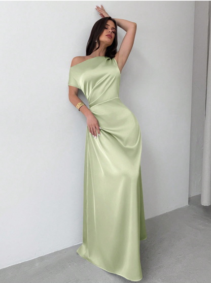 Model wearing the Fashzeo green satin one-shoulder maxi gown with ruched detailing