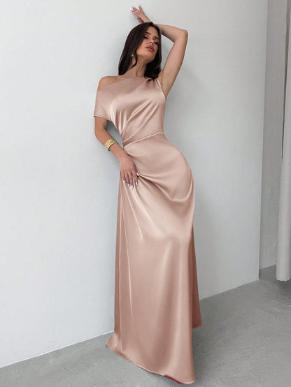 Model wearing the Fashzeo pink satin one-shoulder maxi gown with ruched detailing