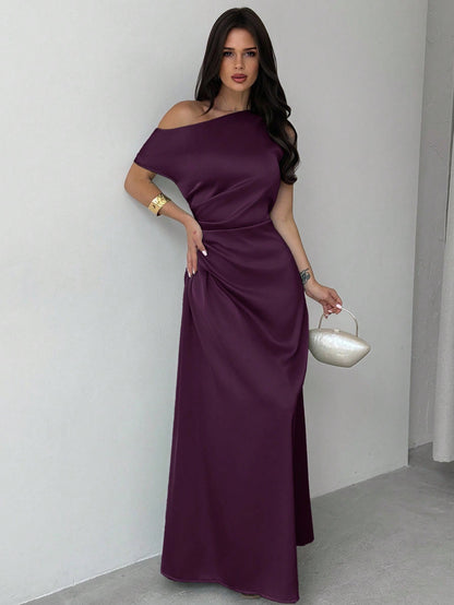 Model wearing the Fashzeo purple satin one-shoulder maxi gown with ruched detailing