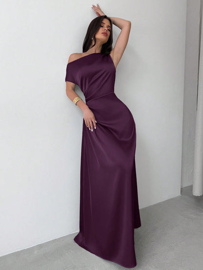 Model wearing the Fashzeo purple satin one-shoulder maxi gown with ruched detailing
