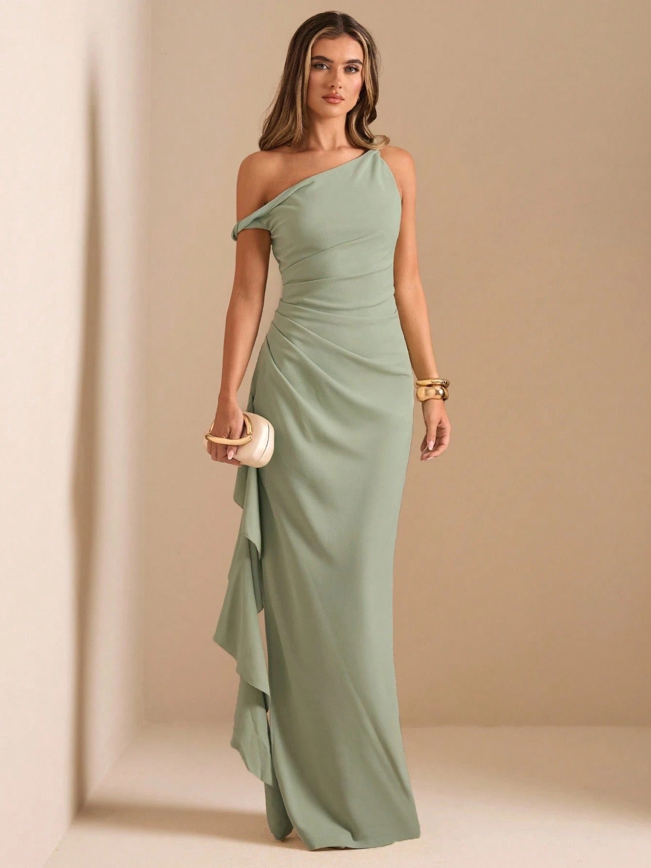 Model wearing the Fashzeo sage green asymmetric one-shoulder maxi gown with high-leg slit