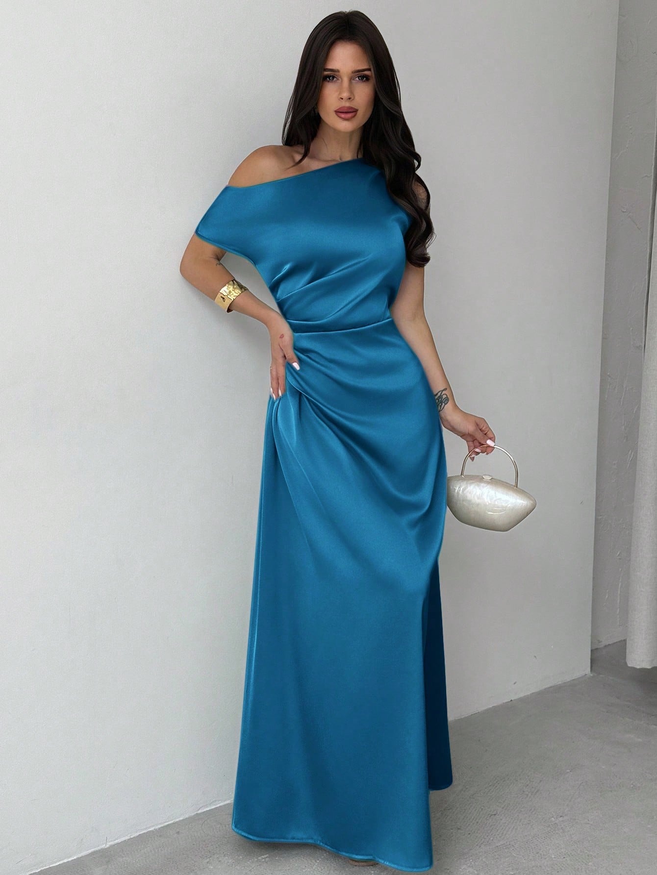 Model wearing the Fashzeo teal blue satin one-shoulder maxi gown with ruched detailing