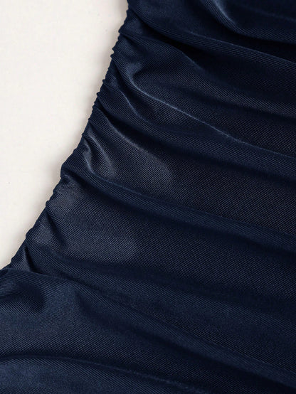 Navy Blue spaghetti strap belted long dress with a slim fit vintage silhouette and adjustable straps for women by Fashzeo.